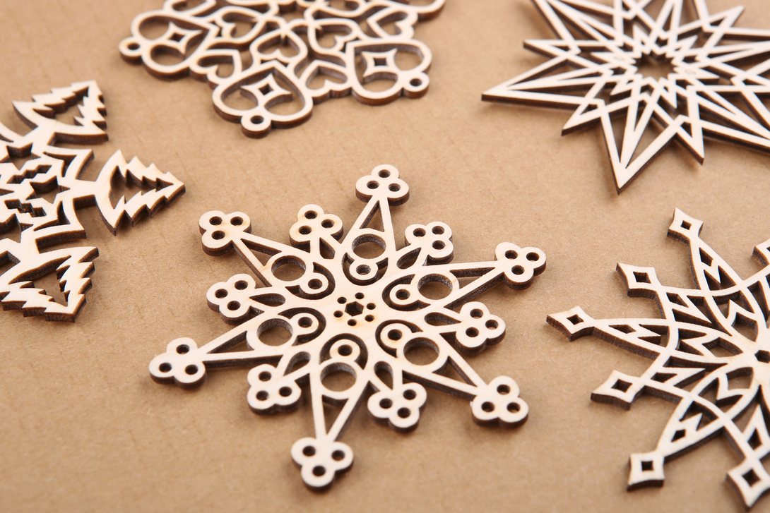 Laser cut wood snowflakes ornaments.